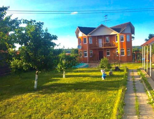 Фотография гостевого дома Коттедж со всеми удобствами