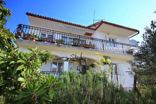 Фотография гостевого дома Apartments by the sea Rogoznica - 10002