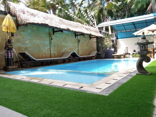 Фотографии гостиницы 
            Bali 85 Beach Inn