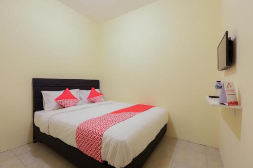 Фотография гостиницы OYO 779 Mn One Residence Syariah