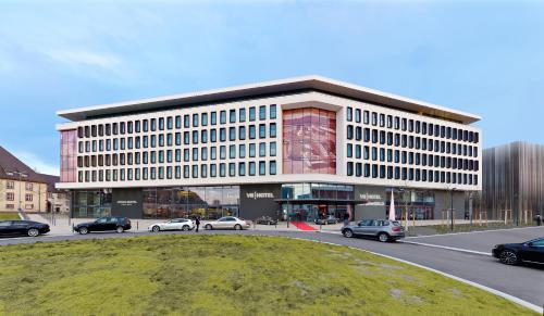 Фотографии гостиницы 
            V8 HOTEL Motorworld Region Stuttgart