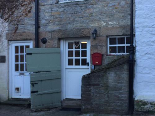 Фотография гостевого дома 'Stokoe Cottage'