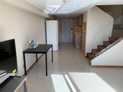 Фотография гостиницы iFamily Apart Hotel Waigaoqiao Branch