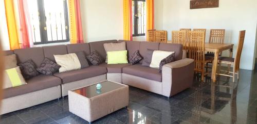 Фотография гостевого дома 4 bedrooms house with sea view enclosed garden and wifi at Mahebourg 2 km away from the beach