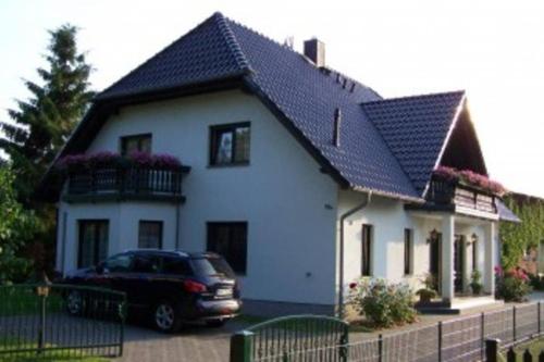 Фотография гостевого дома Ferienhaus Eichhörnchen am Fleesensee