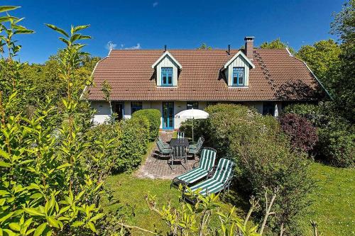 Фотография гостевого дома Ferienhaussiedlung Strandperlen Küstenhof 3b (Typ V)