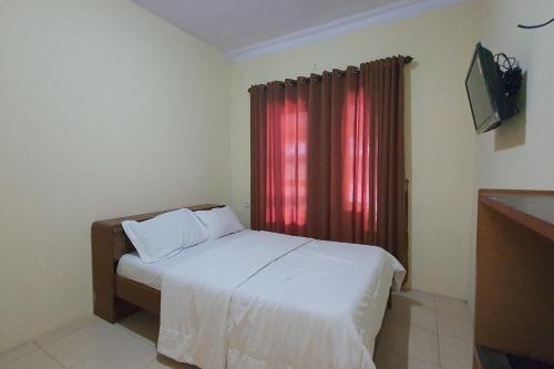 Фотография гостиницы OYO 90154 Anugrah Rr Syariah