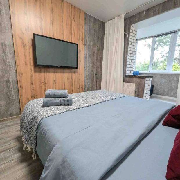 Фотографии квартиры 
            Апартаменты Новые в тихом центре и хвойным лесом за окном