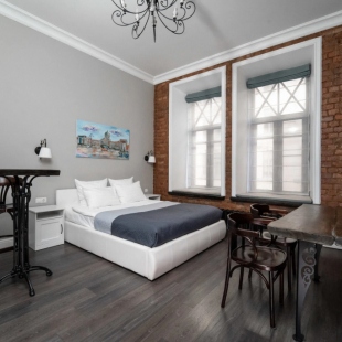 Фотография квартиры Апартаменты Дизайнерская студия в стиле лофт с видом в парадный двор