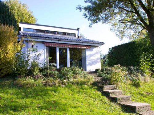 Фотография гостевого дома Detached Holiday Home in Gemmenich with Forest Views