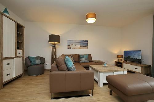 Фотографии гостевого дома 
            Reethaus Am Mariannenweg 12a