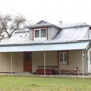 Фотография гостевого дома У МИХАИЛА под лесом