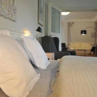 Фотографии мини отеля
Galerie Suites