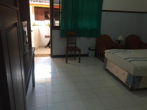 Фотография гостиницы OYO 1369 Griya Damai Syariah