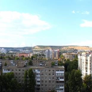 Фотография квартиры Апартаменты Apato Уютная студия с видом на город и горы