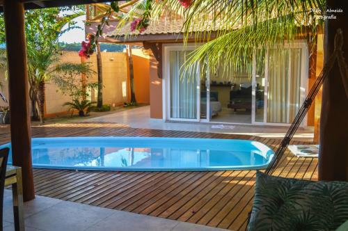 Фотография гостевого дома Casa de beira mar com piscina