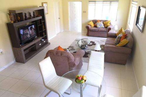 Фотография гостевого дома Juds Vacation home in Hartlands Estate, Priory JA