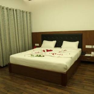 Фотографии гостиницы
Four N Square Residency