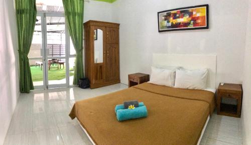 Фотография хостела The Cheap & Cozy Canggu