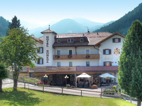Фотографии гостиницы 
            Alpenlife Hotel Someda