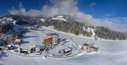 Фотография апарт отеля ApartHotel Asterhof und seine Ferienhäuser