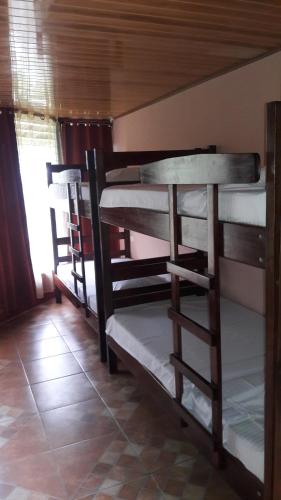 Фотографии гостевого дома 
            Hostal y cabinas anita-and rafting tour!