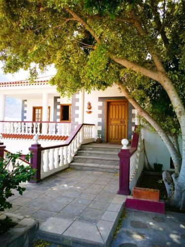 Фотография гостевого дома 2 bedrooms house with shared pool enclosed garden and wifi at Buenavista del Norte 1 km away from the beach