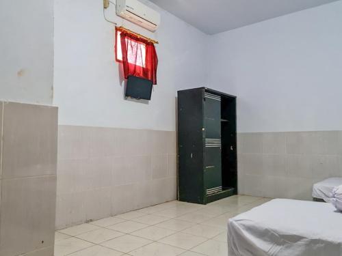 Фотография гостиницы Khresna Guest House Malioboro RedPartner