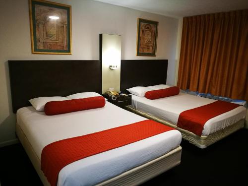 Фотография мотеля Merida Inn & Suites