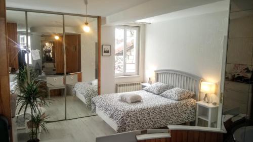 Фотография гостевого дома Maison 10 personnes station Les 7 Laux - GÎTE REDROOSTER HOME -