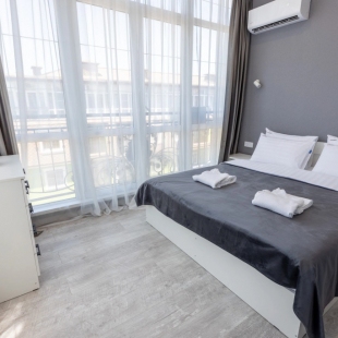 Фотография квартиры Апартаменты Red Apartments Арт Лайт Сити Грант