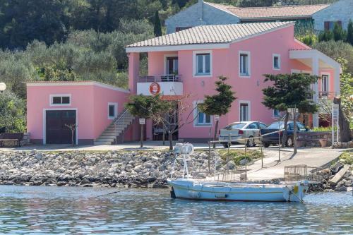 Фотография гостевого дома Apartments by the sea Veli Rat, Dugi otok - 11525