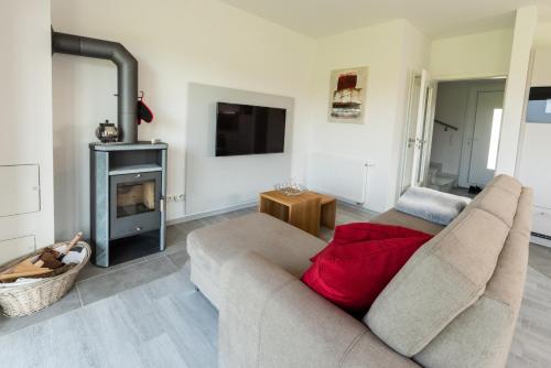 Фотография гостевого дома Ferienhaus 4827 in Tossens