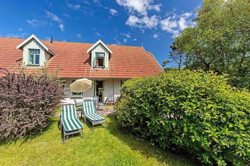 Фотография гостевого дома Ferienhaussiedlung Strandperlen Küstenhof 1c (Typ V)