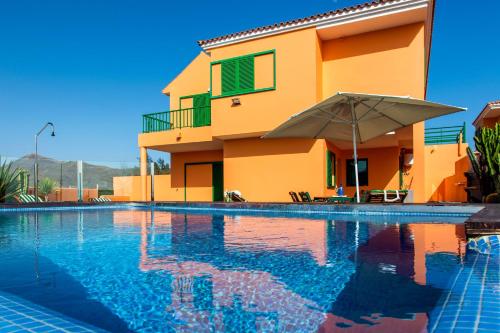 Фотография гостевого дома Tarajalejo Village