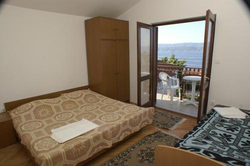 Фотография гостевого дома Apartments with a parking space Stanici, Omis - 1027