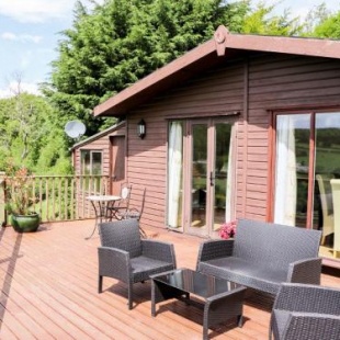 Фотография гостевого дома Summertime Lodge