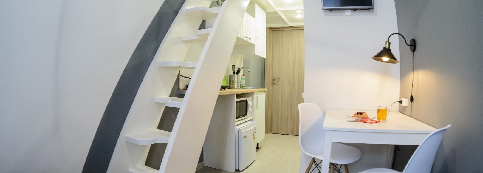 Фотография квартиры Семейные дизайнерские двухуровневые апартаменты в самом центре 