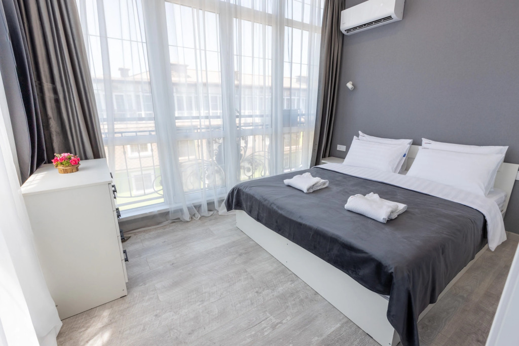 Фотография квартиры Апартаменты Red Apartments Арт Лайт Сити Грант