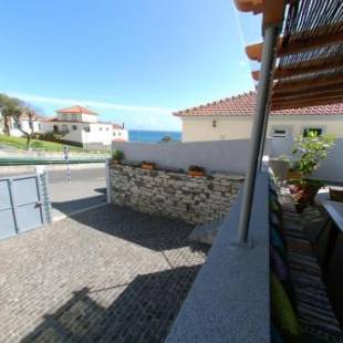 Фотографии гостевого дома 
            Estrela do Mar - Alojamento Local