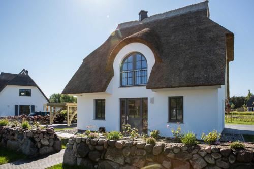 Фотография гостевого дома Ferienhaus Schilfrohrsaenger 54