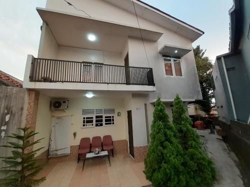 Фотография гостиницы Kost Carmelia Syariah Baranangsiang Bogor