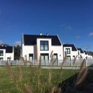 Фотографии гостевого дома 
            Ferienhäuser im Yachthafen