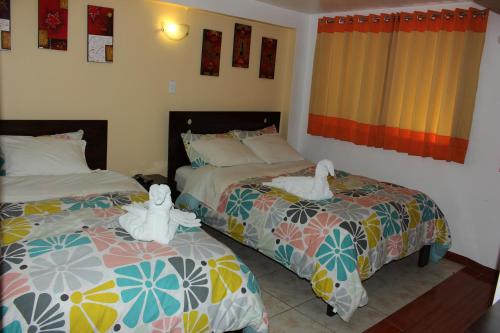 Фотографии мини отеля 
            Hospedaje Qori Punku