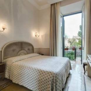 Фотографии гостевого дома 
            Rome Charming Suites