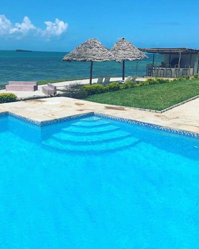 Фотография гостиницы Calamari Beach Villas