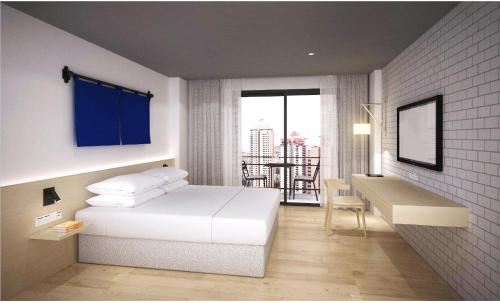 Фотография гостиницы Oakwood Journeyhub Pattaya SHA Extra Plus