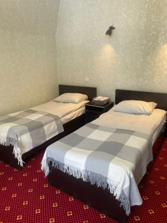 Фотография квартиры Апартаменты Уютный Номер в Сердце Домбая