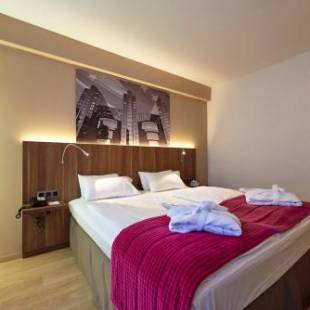 Фотографии гостиницы 
            Holiday Inn Brussels Schuman, an IHG Hotel