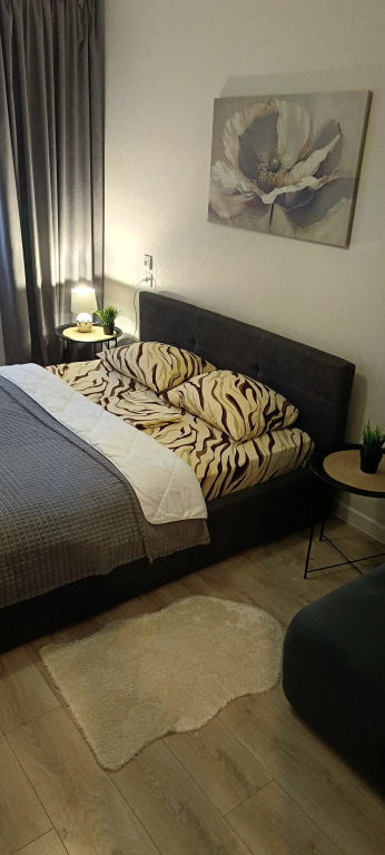 Фотография квартиры Квартира Уютная Студия Плюс Спальня